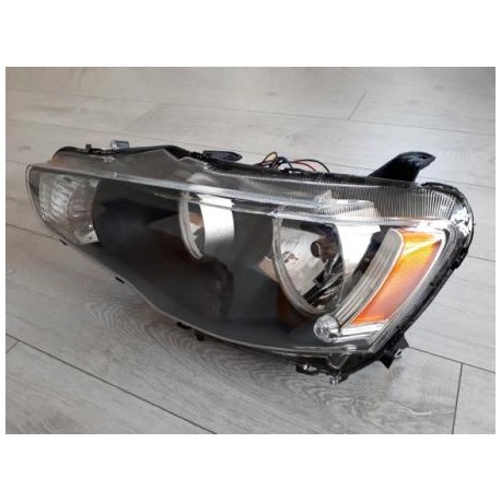 Фара левая Лансер 10